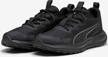 Scarpa da corsa 'Twitch Runner Trail' di PUMA in nero: frontale