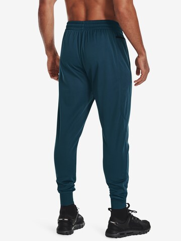 UNDER ARMOUR Tapered Sporthose in Grün