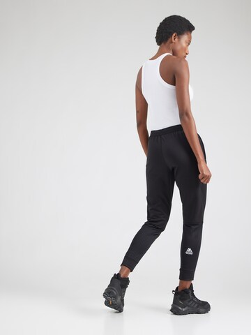 THE NORTH FACE - Tapered Pantalón deportivo 'Mountain Athletics' en negro