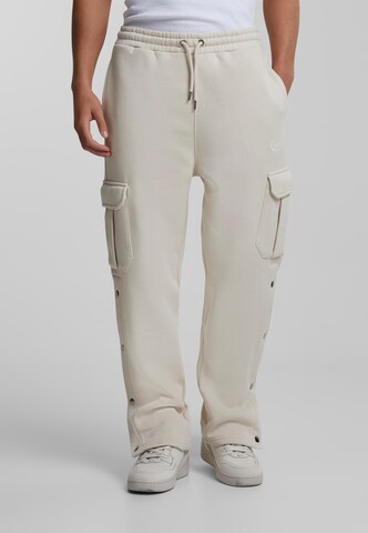 Karl Kani Loose fit Cargo Pants in Beige: front