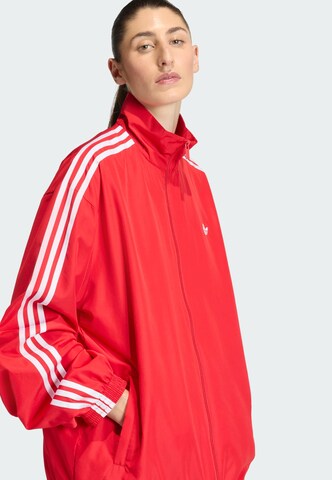 ADIDAS ORIGINALS Between-season jacket 'Firebird Adilenium' in Red