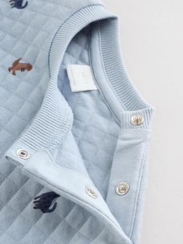 Set Next en bleu