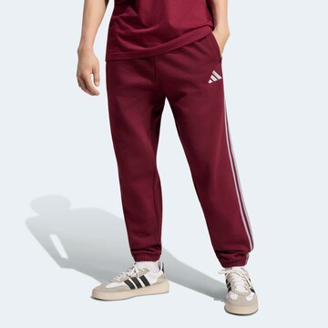 ADIDAS SPORTSWEAR Tapered Pants in Red