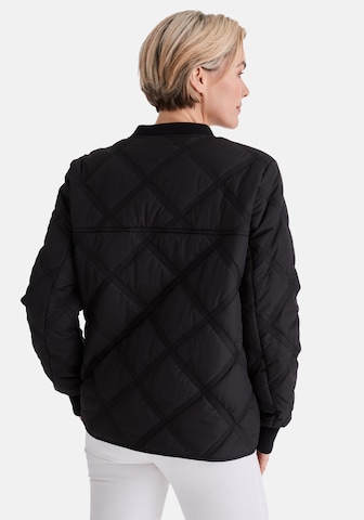 Veste mi-saison 'Juliet' STOOKER WOMEN en noir