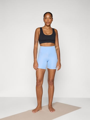 Skinny Pantalon de sport new balance en bleu