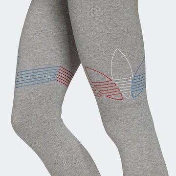 Skinny Pantalon de sport ADIDAS ORIGINALS en gris