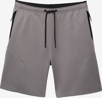 Pull&BearLoosefit Hlače - siva boja: prednji dio