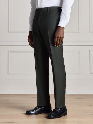 Slimfit Pantaloni con piega frontale di Next in verde: frontale