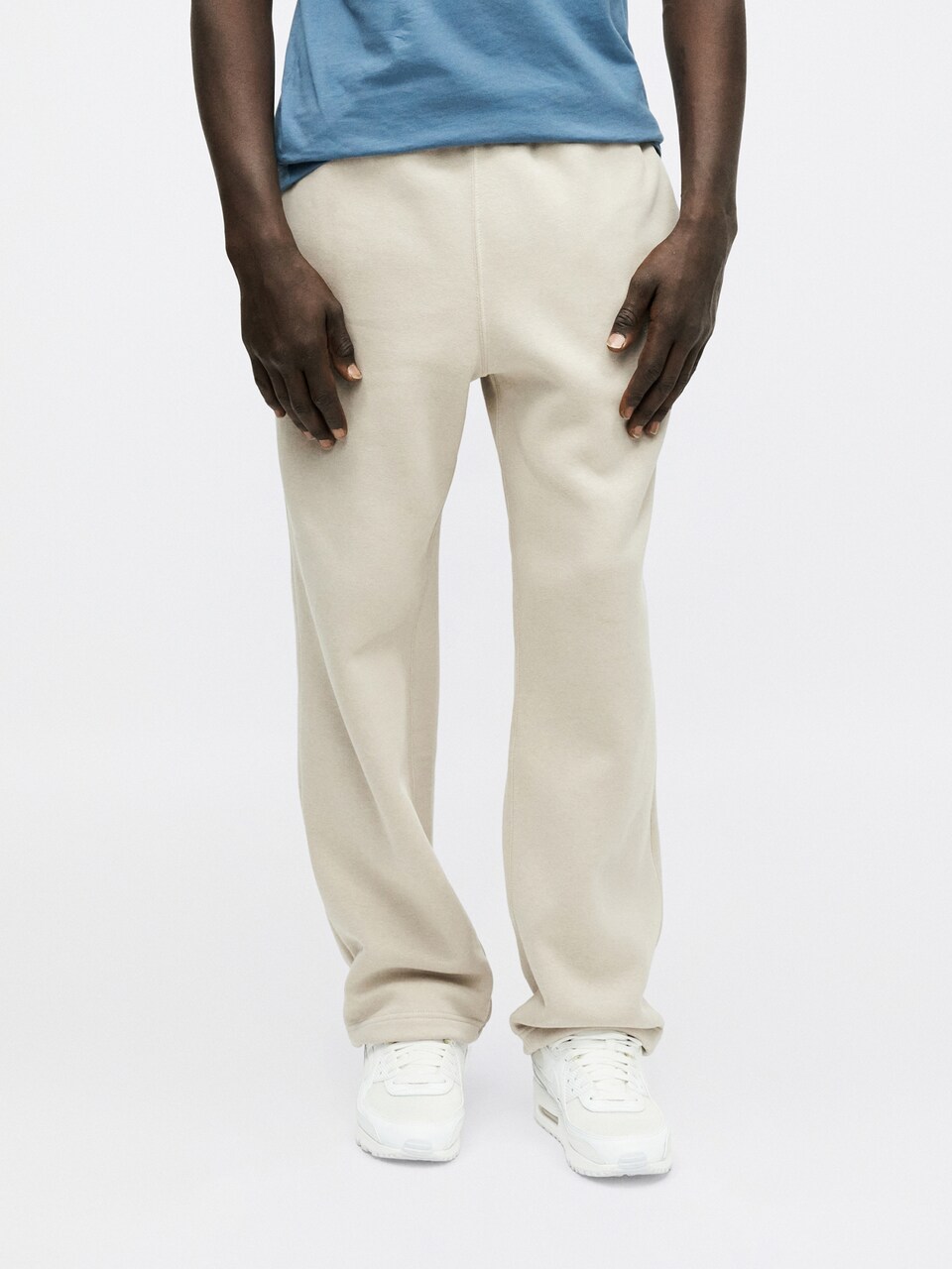 Regular Pantaloni 'ATHL CLUB' de la Nike Sportswear pe bej: față