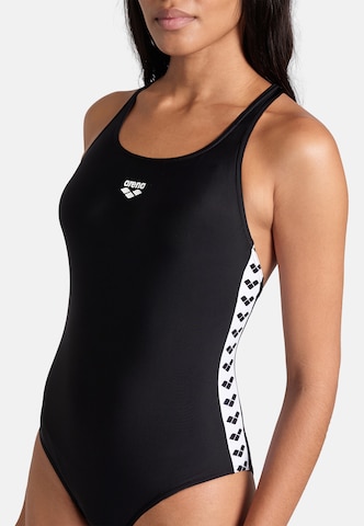 ARENA Bustier Urheilu-uimapuku 'ICONS' värissä musta