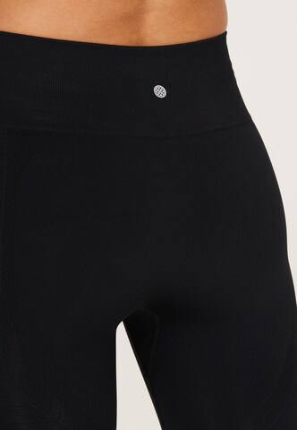 Skinny Pantaloni sportivi 'Nagar' di Athlecia in nero