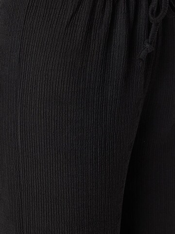 Wide leg Pantaloni di Happiness İstanbul in nero