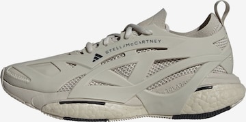 ADIDAS BY STELLA MCCARTNEY - Sapatilha de corrida 'Solarglide' em bege: frente