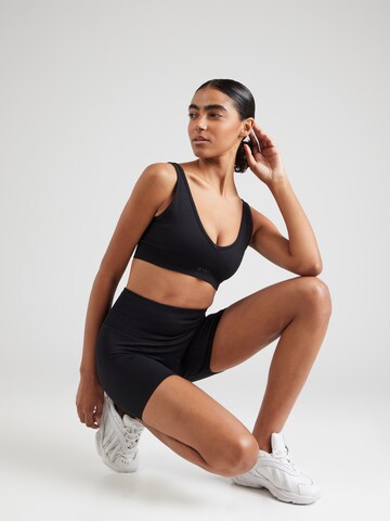 Aim'n Skinny Sports trousers in Black
