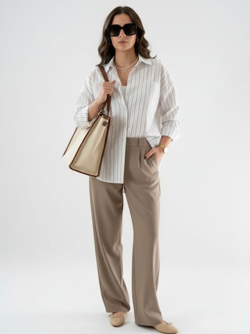 WEARABLE STORIES - Blusa 'Jess' en beige