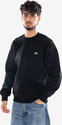 LACOSTE Sweatshirt i sort: forside