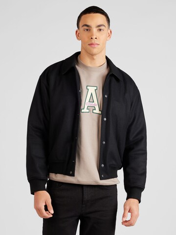 FRAME Between-season jacket in Black: front