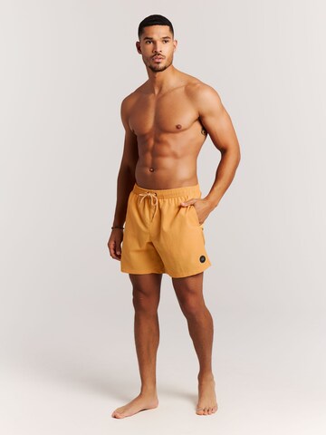 Shorts de bain 'Faster' PROTEST en jaune