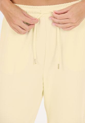 Athlecia Tapered Sweatpants 'Jacey' in Gelb
