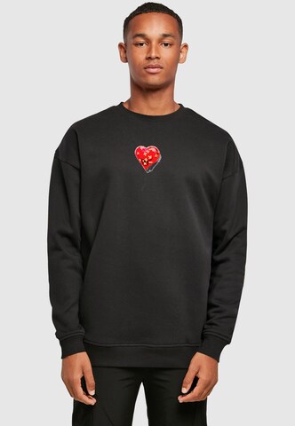 Merchcode Sweatshirt 'Banksy - Love Hurts' in Black: front