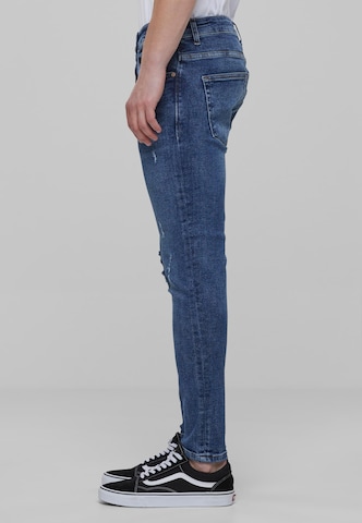 Karl Kani Skinny Jeans in Blue