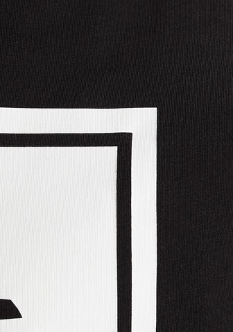 TIMBERLAND Tričko ' Stack Logo ' – černá