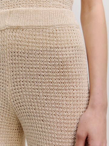 EDITED Wide leg Trousers 'Vineta' in Beige
