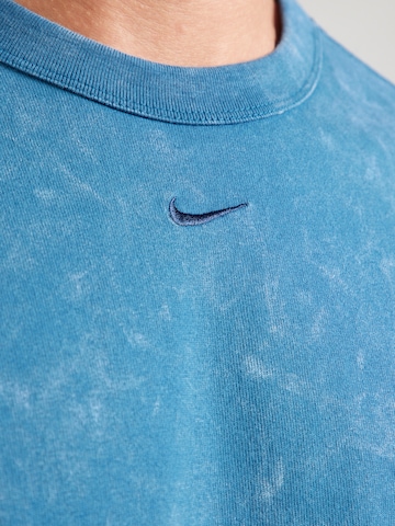 T-Shirt 'ESS' Nike Sportswear en bleu