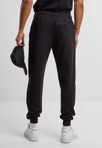 Urban Classics Конический (Tapered) Штаны в Черный