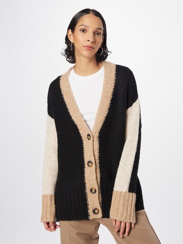 Cartoon Knit cardigan in Beige: front