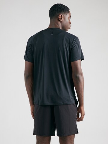 NIKE Функциональная футболка 'ADV STRIDE' в Черный