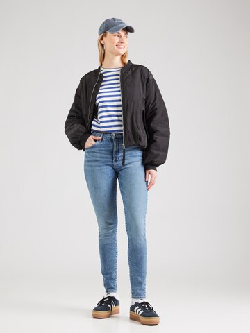 Skinny Jean WRANGLER en bleu