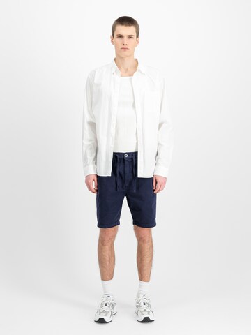 regular Pantaloni sportivi di ALPHA INDUSTRIES in blu