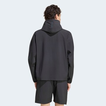 ADIDAS SPORTSWEAR Athletic Jacket 'Z.N.E. Woven Track' in Black