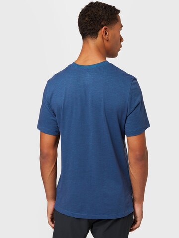 NIKE - Camiseta funcional en azul