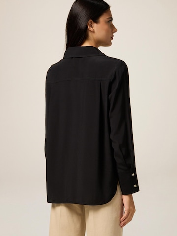 oltre Bluse‌‌‌ in Schwarz