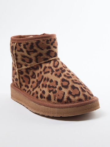 Botine de la Trendyol pe maro