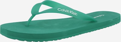 Šlepetės per pirštą iš Calvin Klein, spalva – smaragdinė spalva / balta, Prekių apžvalga