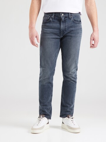 LEVI'S ® Tapered Jeans '512' in Blue: front