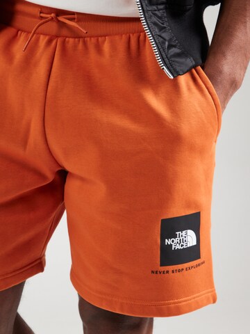THE NORTH FACE Regular Housut värissä oranssi