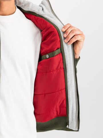 ALPHA INDUSTRIES Between-Season Jacket 'MA-1 D-Tec' in Green