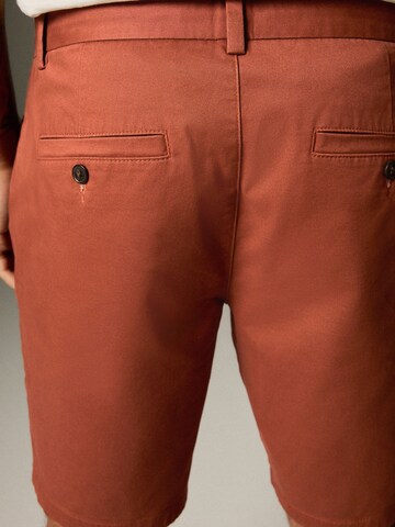 Next - regular Pantalón chino en rojo