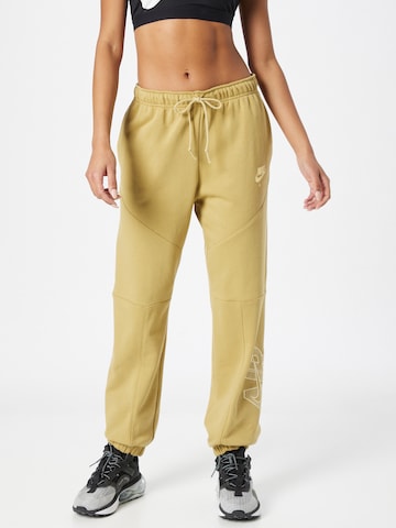 Nike Sportswear Tapered Pants in Beige: front