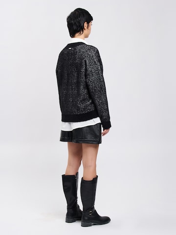 Influencer Pullover in Schwarz