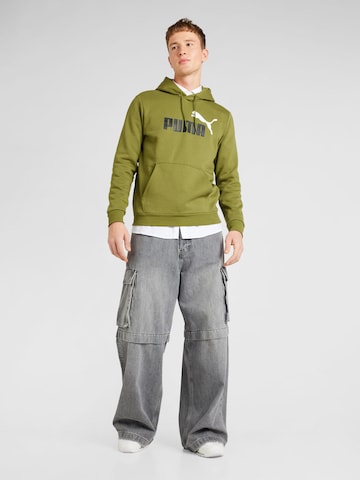 PUMA - Sweatshirt de desporto 'ESS+ 2' em verde