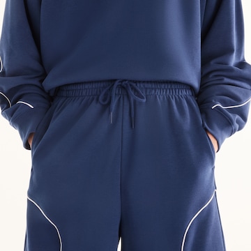 new balance Loose fit Trousers 'Trackside' in Blue