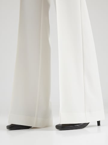 Copenhagen Studios Široke hlačnice Hlače na rob | bež barva