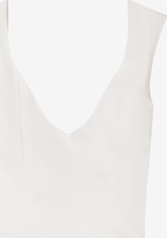 Top de la Bershka pe bej: față