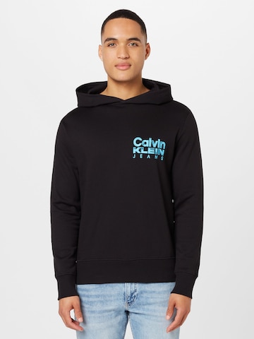 Sweat-shirt Calvin Klein Jeans en noir : devant