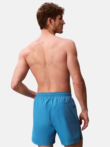 Calvin Klein Szorty kąpielowe 'CALVIN KLEIN MEDIUM DRAWSTRING Costumi da bagno' w kolorze niebieski